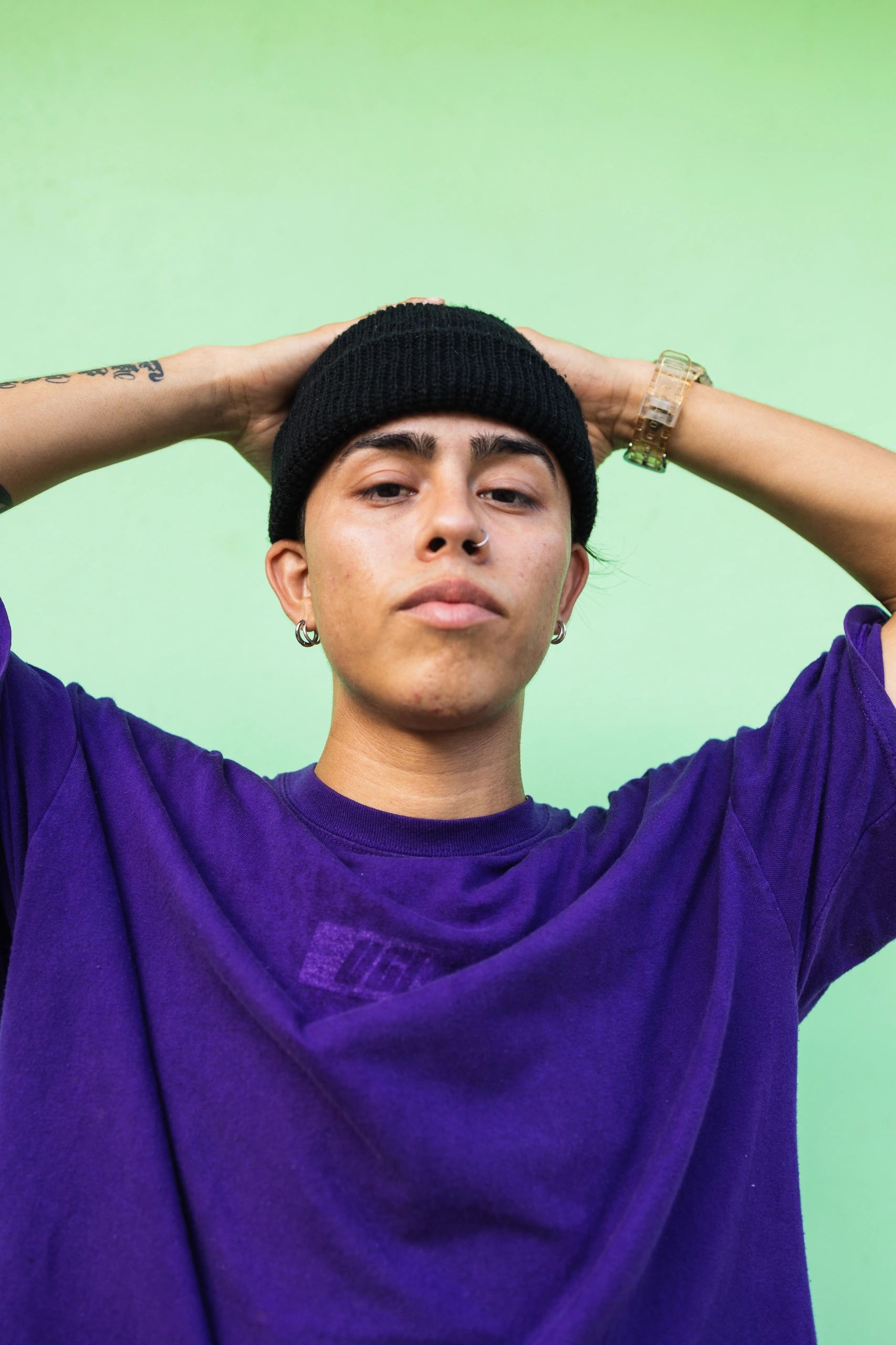 Portrait of a young Latin man looking at camera